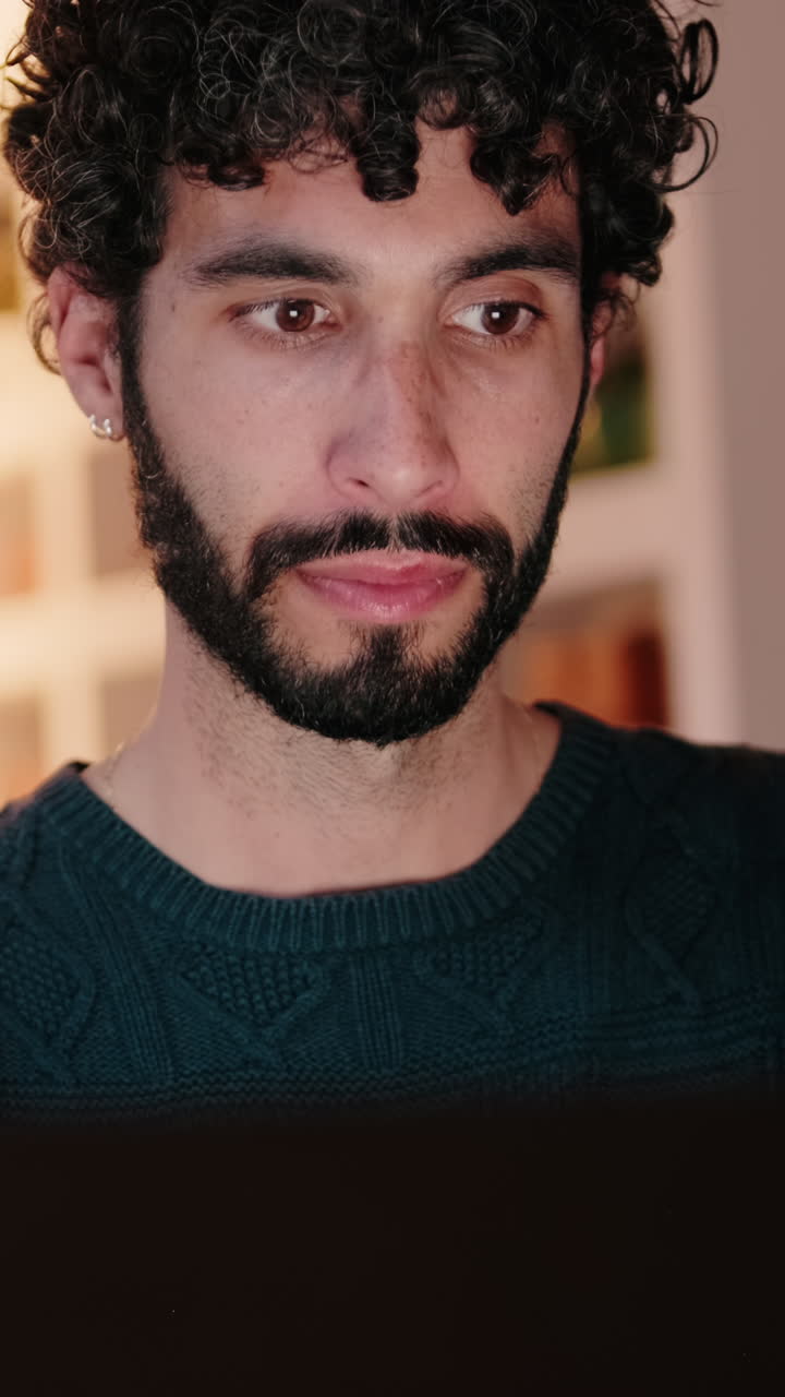 Gay Couple at Home Working on Laptop