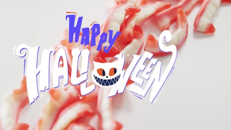 animation of happy halloween text with cat over teeth sweets