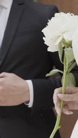 couple holding a wedding bouquet