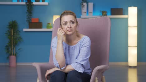 Woman-looking-thoughtfully-at-camera.