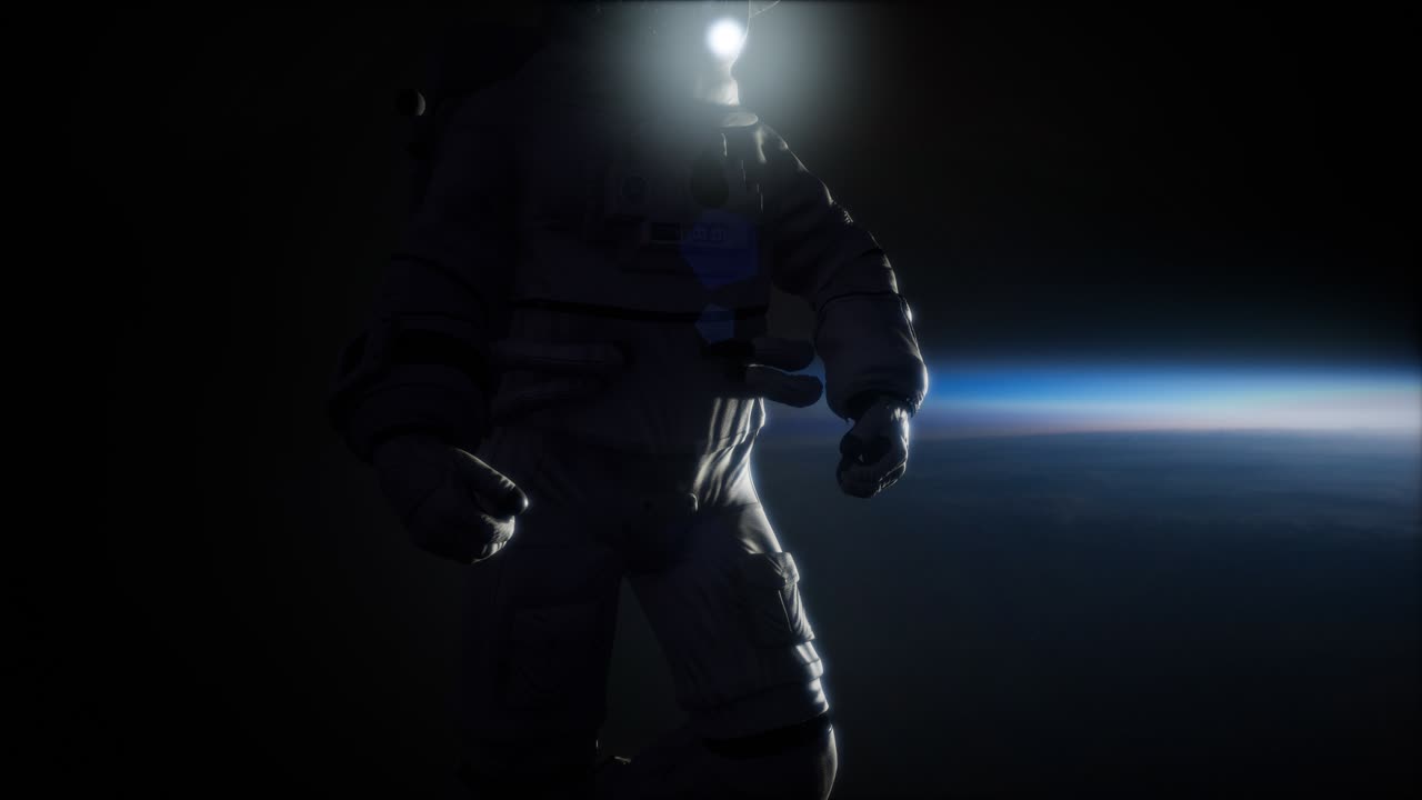 Astronaut in outer space against the backdrop of the planet earth. image of the Earth furnished by NASA