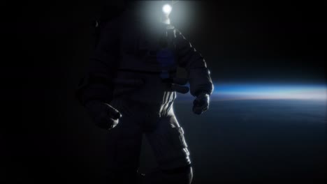 Astronauta-En-El-Espacio-Ultraterrestre-Contra-El-Telón-De-Fondo-Del-Planeta-Tierra.-Imagen-De-La-Tierra-Provista-Por-La-Nasa