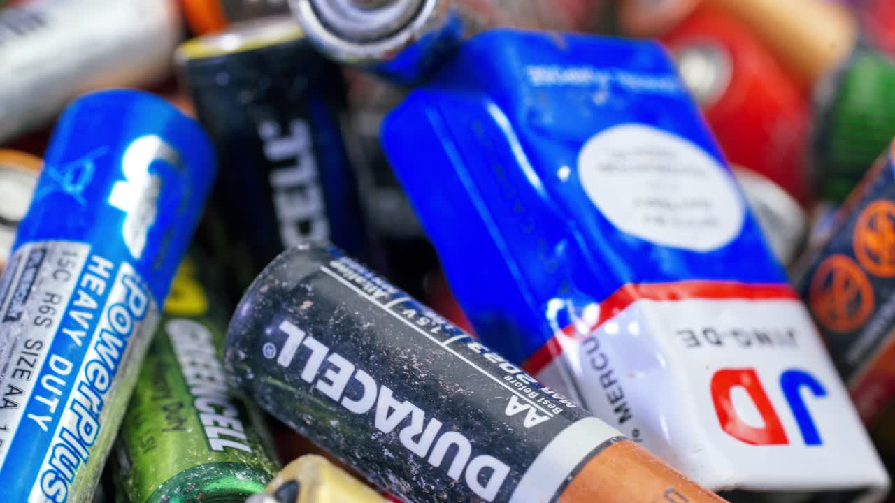 Used Alkaline Batteries. Dead Single-use Batteries before Disposal