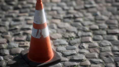 orange and white striped traffic cone