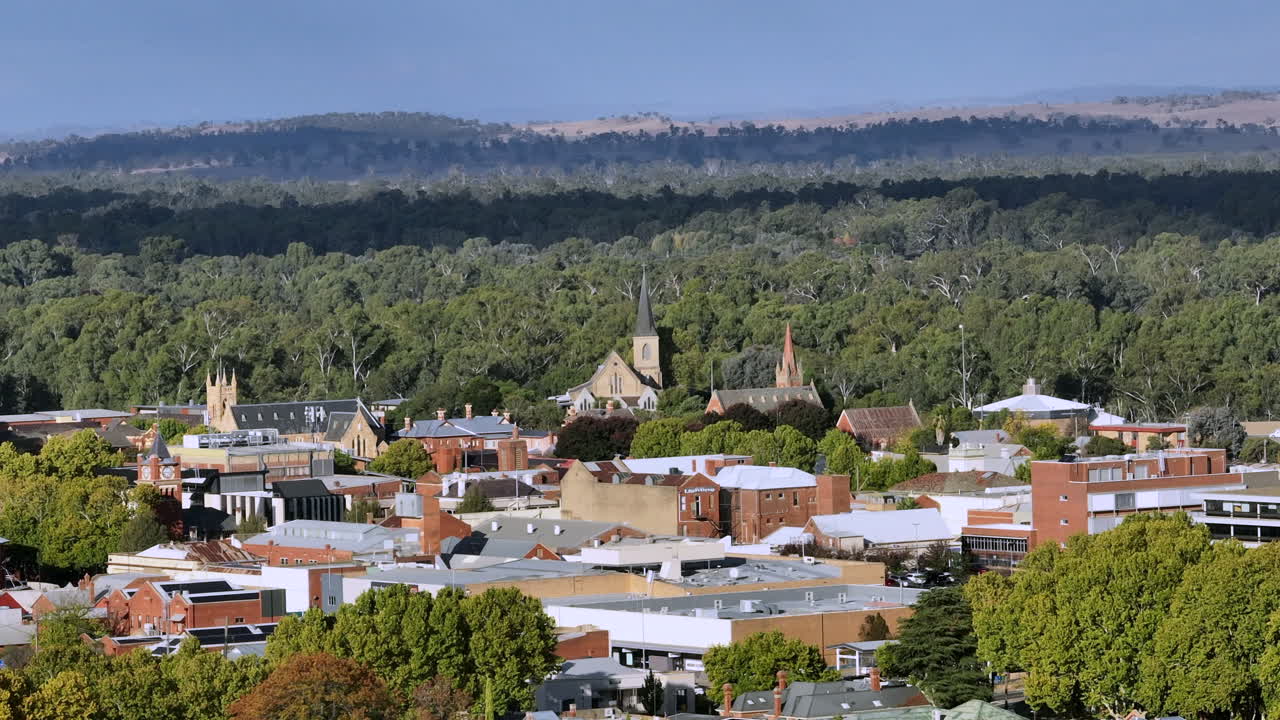 Aerial: Drone shot of churches and buildings in Wagga Wagga, NSW Australia