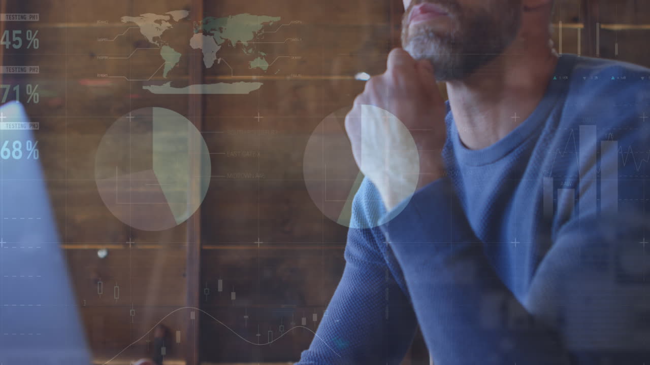 Animation of statistical data processing against thoughtful caucasian man using laptop at home