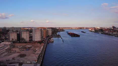 aerial view of construction development beside oude maas in dordrecht