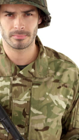 soldier standing with rifle on white background