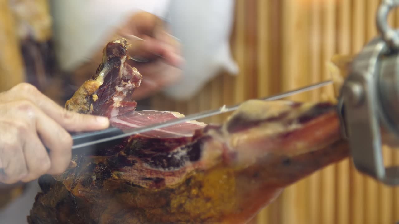 Butcher Slicing Ham