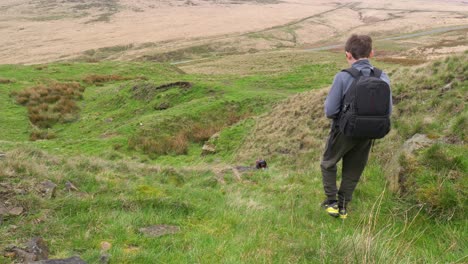 Young-boy-outdoors-on-the-moors-playing-with-his-RC-Car,-Truck,-4-x-4