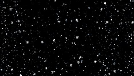 several snow particles falling down over a black background