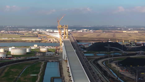 aerial view rotating away from the beltway 8 bridge, golden hour in houston, usa
