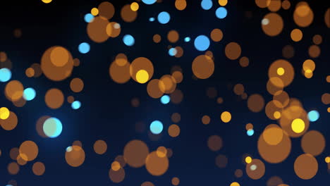 glowing blue and orange bokeh lights animation on dark background