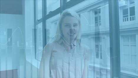 animation of diagrams over caucasian businesswoman smiling