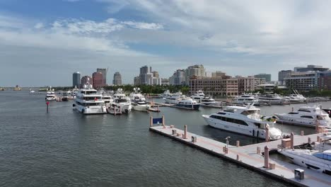 Aerial-establishing-shot-of-parking-yachts-at-port-of-Palm-Harbor-Marina-during-sunny-day