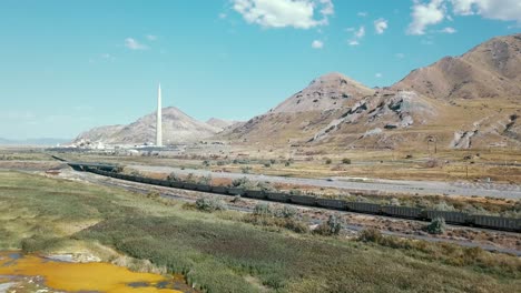 Cargo-freight-train-along-Kessler-peak-at-Great-salt-lake-state-park