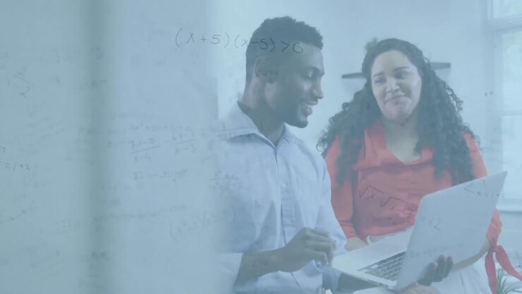 Animation of math formulas over diverse female and male coworkers in office