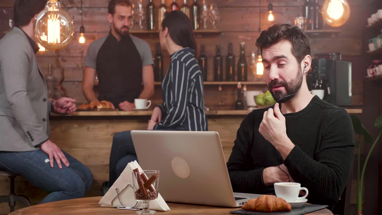 People at a Cafe Working and Socializing