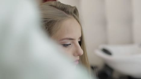 woman getting her hair done at a salon