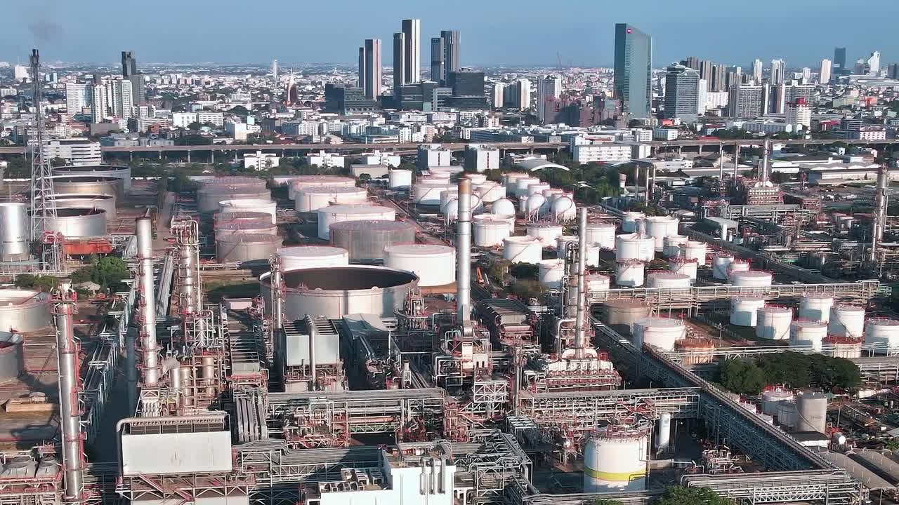 View of Bangkok industrial area with storage tanks and buildings visible