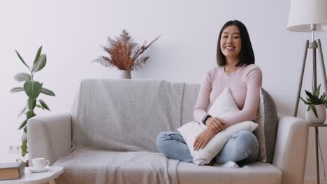 young woman relaxing on a sofa