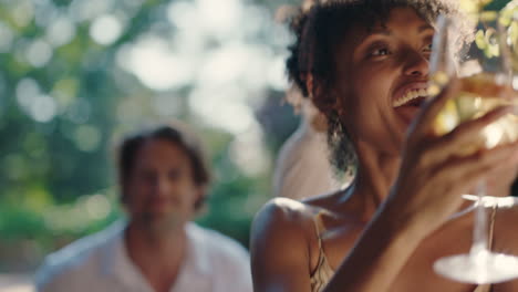 beautiful-african-american-woman-dancing-with-friends-at-summer-dance-party-drinking-wine-enjoying-summertime-social-gathering-having-fun-celebrating-on-sunny-day-4k-footage