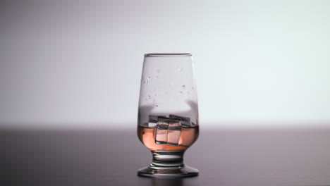 drink on the rocks slow motion light effect
