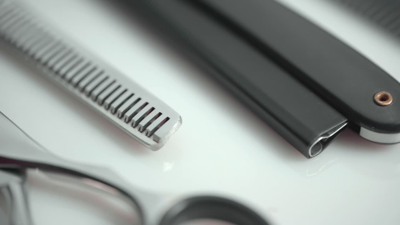 Macro Shot Of Hairdressing Scissors And Tools, Rotating On White Background