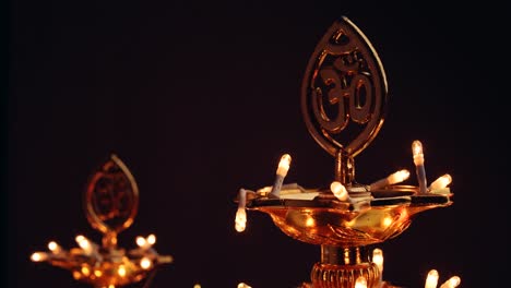 diyas being lit at diwali- festival of lights