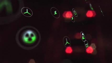 green energy and hazard symbols animation over blurred red lights background