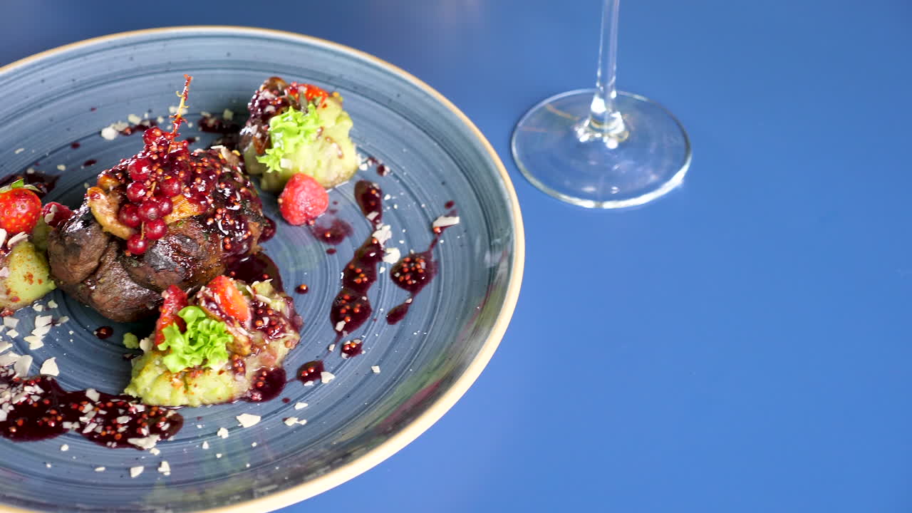 Exquisite Meat Dish with Berries and Avocado