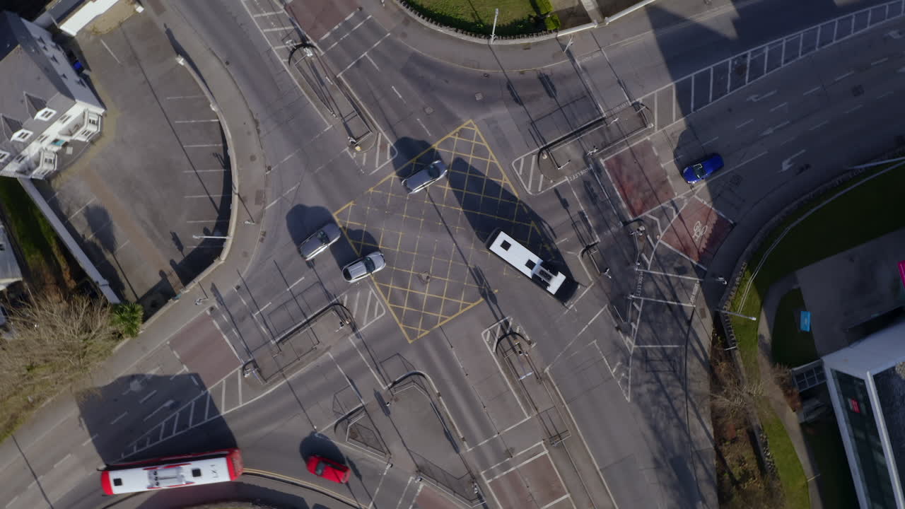 Aerial top-down rotating shot of a busy intersection, creating a dynamic view