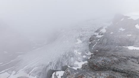 fellaria glacier shrouded in clouds, valmalenco in italy