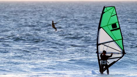 male surfer windsurfing in the beach 4k