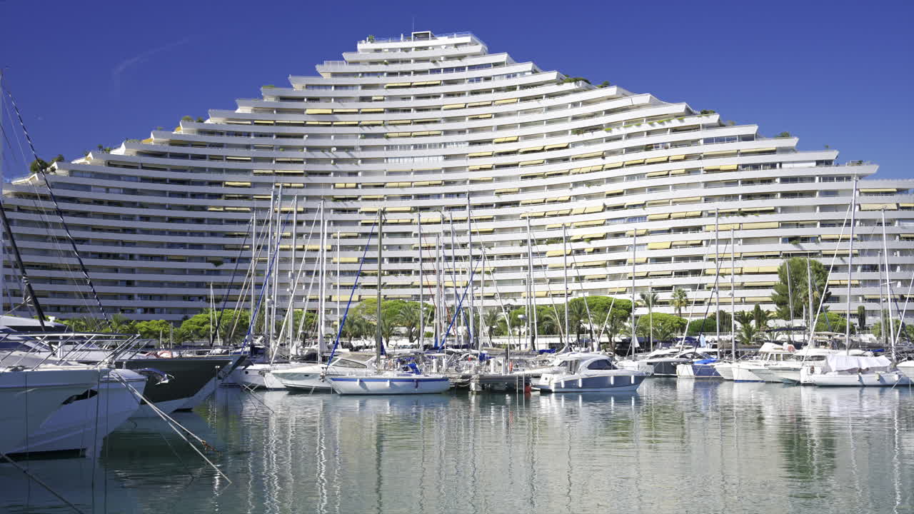 Boats docked in the Marina Baie des Anges in Villeneuve-Loubet, France in daylight