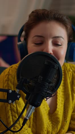 vertical video: influencer talking on professional microphone recording vlog