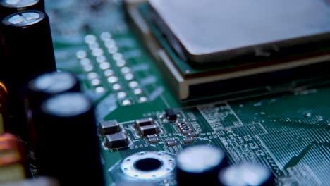 macro computer motherboard showing chips, transistors and circuits