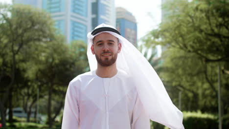 man with arabic clothing in the street