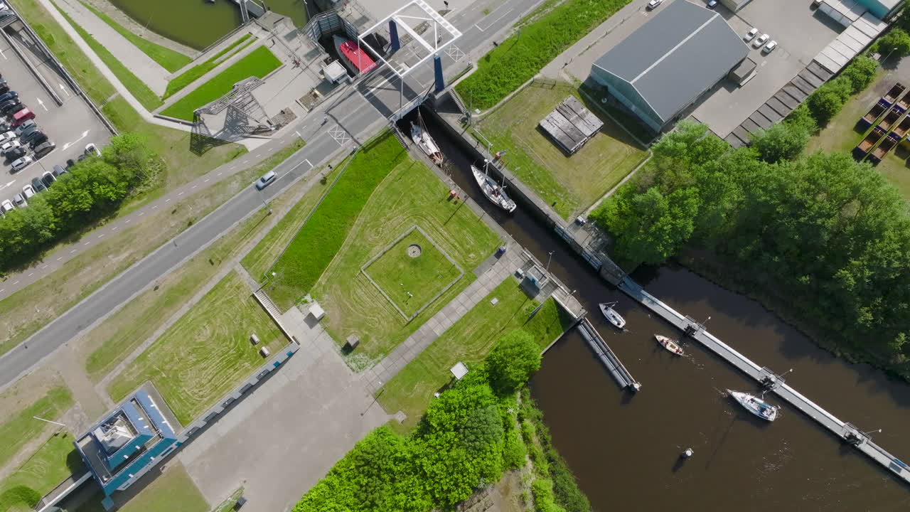 Aerial view of harbour at Lauwersoog in the Netherlands where it opens out into the vast North Sea, emphasising the area's natural beauty and maritime significance