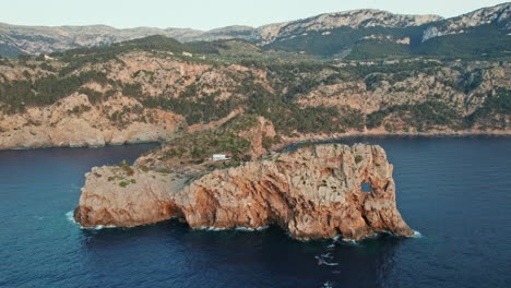 aerial view over punta de sa foradada headland in mallorca, spain - drone shot