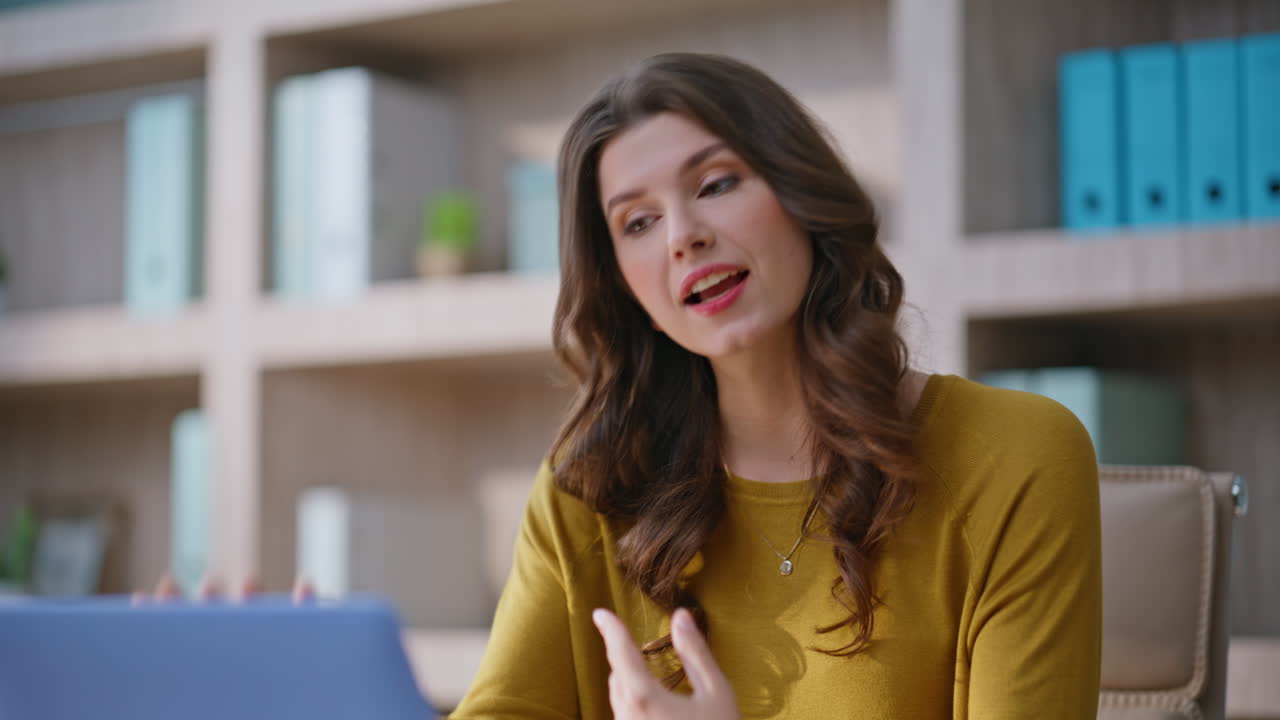 Manager consulting video call at remote workplace closeup. Smiling businesswoman