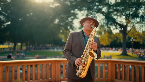 Man Playing Saxophone Outdoors in a Park