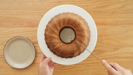 topdown vie of slicing into a delicious marble bundt cake