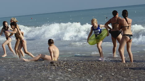 children playing on the beach