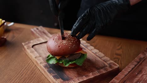 chef preparing a gourmet burger