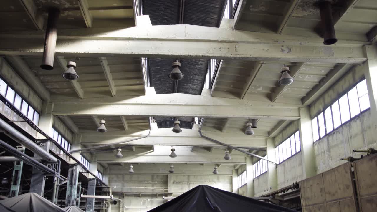 Old factory with mess messy industrial ambience post apocalyptic view like in Chernobyl urban exploring ceiling