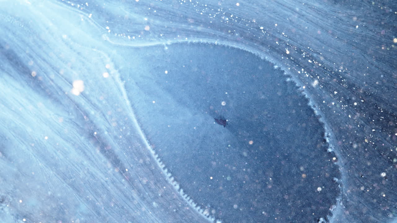 Swirling ink patterns in water, macro shot, creating a calming vibe