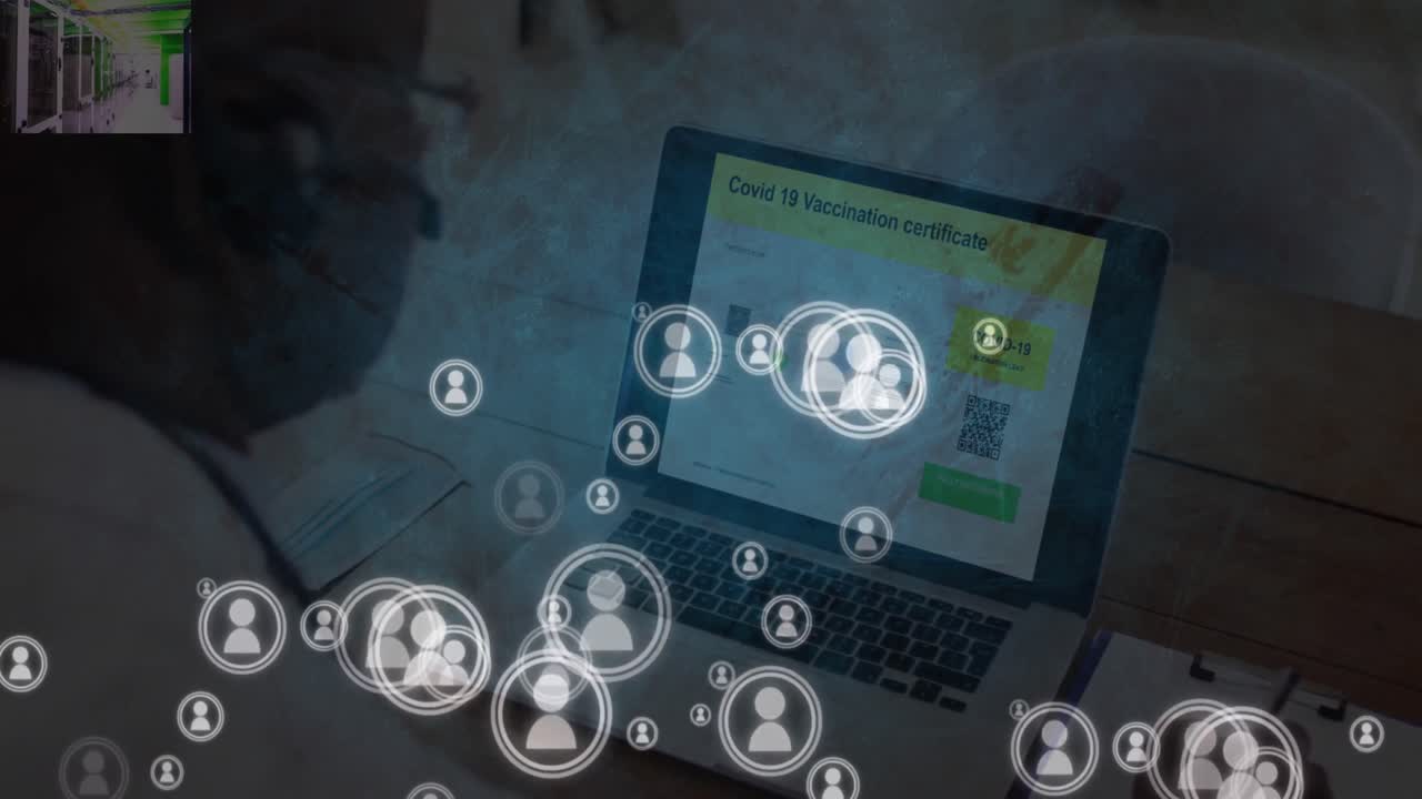 animación de iconos que caen sobre una persona que usa una computadora portátil