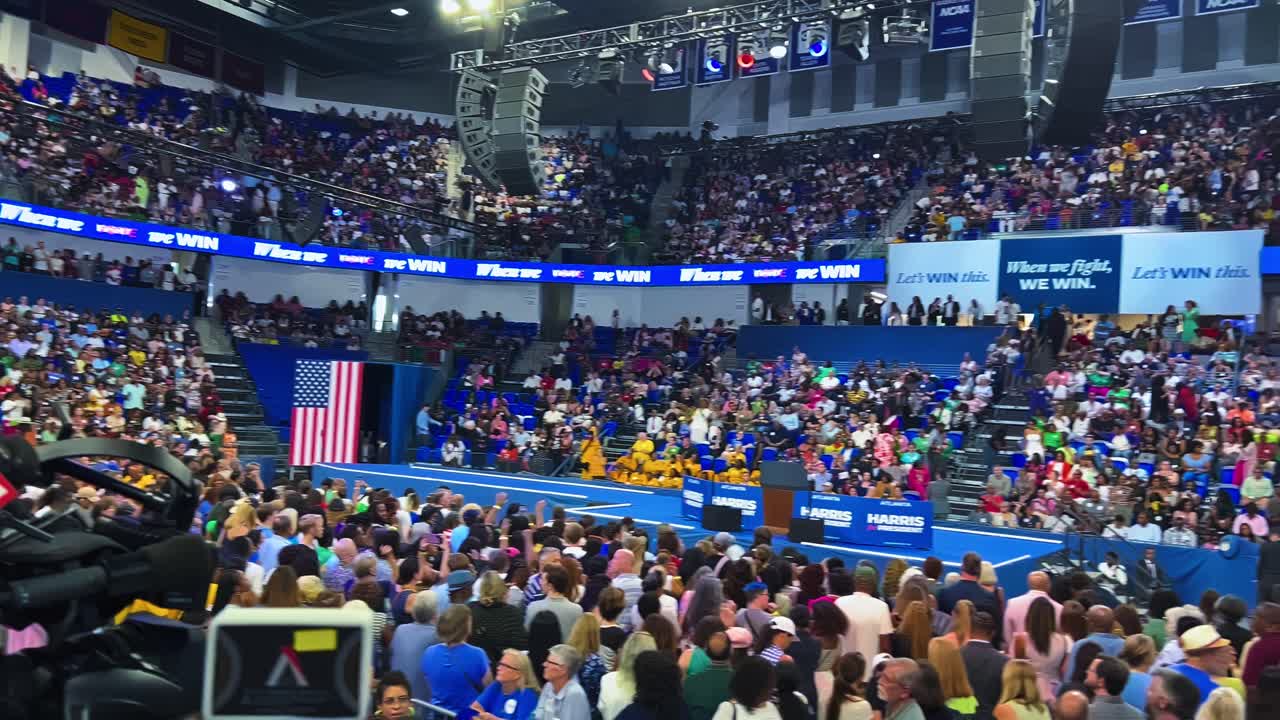 Supporters Gather at a Campaign Rally to Express Their Support for a Candidate in the 2024 U.S. Presidential Election - Panning Shot