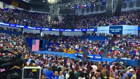 supporters gather at a campaign rally to express their support for a candidate in the 2024 u.s. presidential election - panning shot